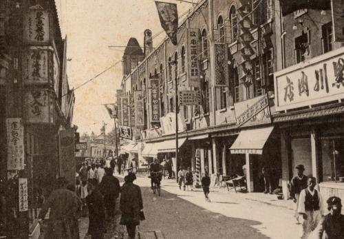 1925, old photographs of capital of South Korea, streets are full of Chinese characters, like a small village

