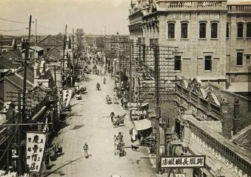1925, old photographs of capital of South Korea, streets are full of Chinese characters, like a small village
