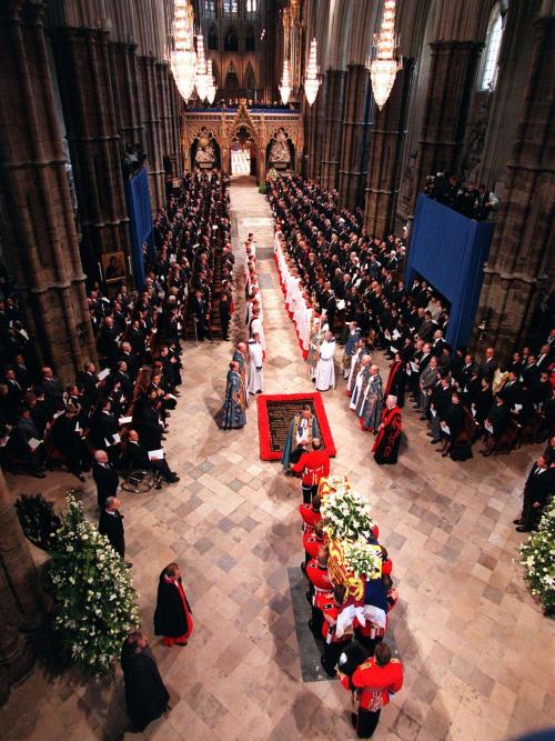 Why was Queen of England buried under a church and not in a graveyard? How does church seal off rotten smell?
